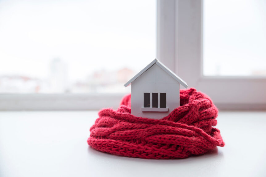 houseinwinter-heatingsystemconceptandcoldsnowy