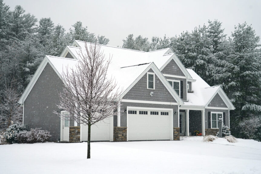 Winter House With Woods In Snow Storm